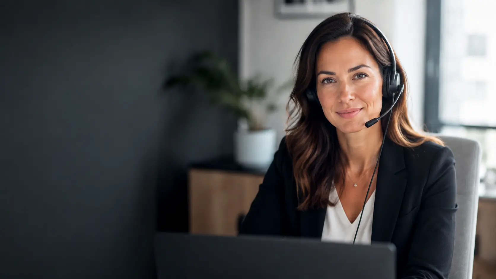 Illustrative customer advisor wearing a headset in an office