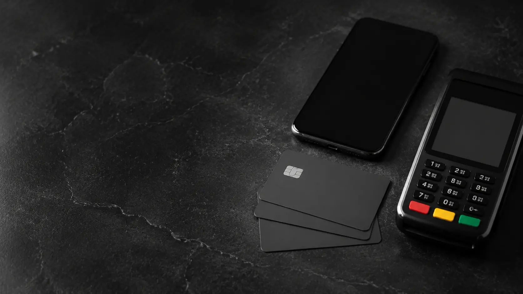 Illustrative smartphone, payment cards and contactless terminal